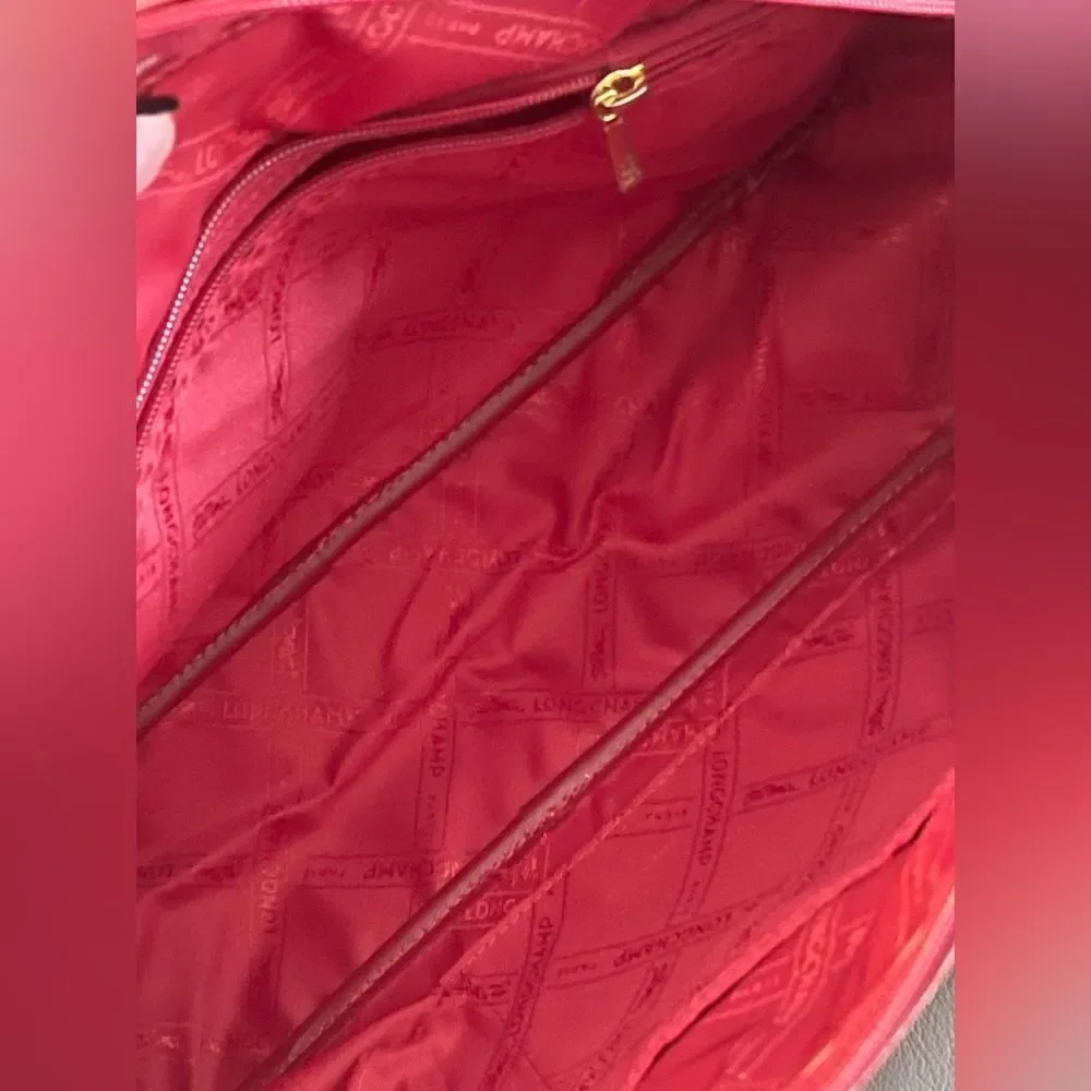 Vintage Longchamp Roseau Leather Bag in the color Bordeaux.